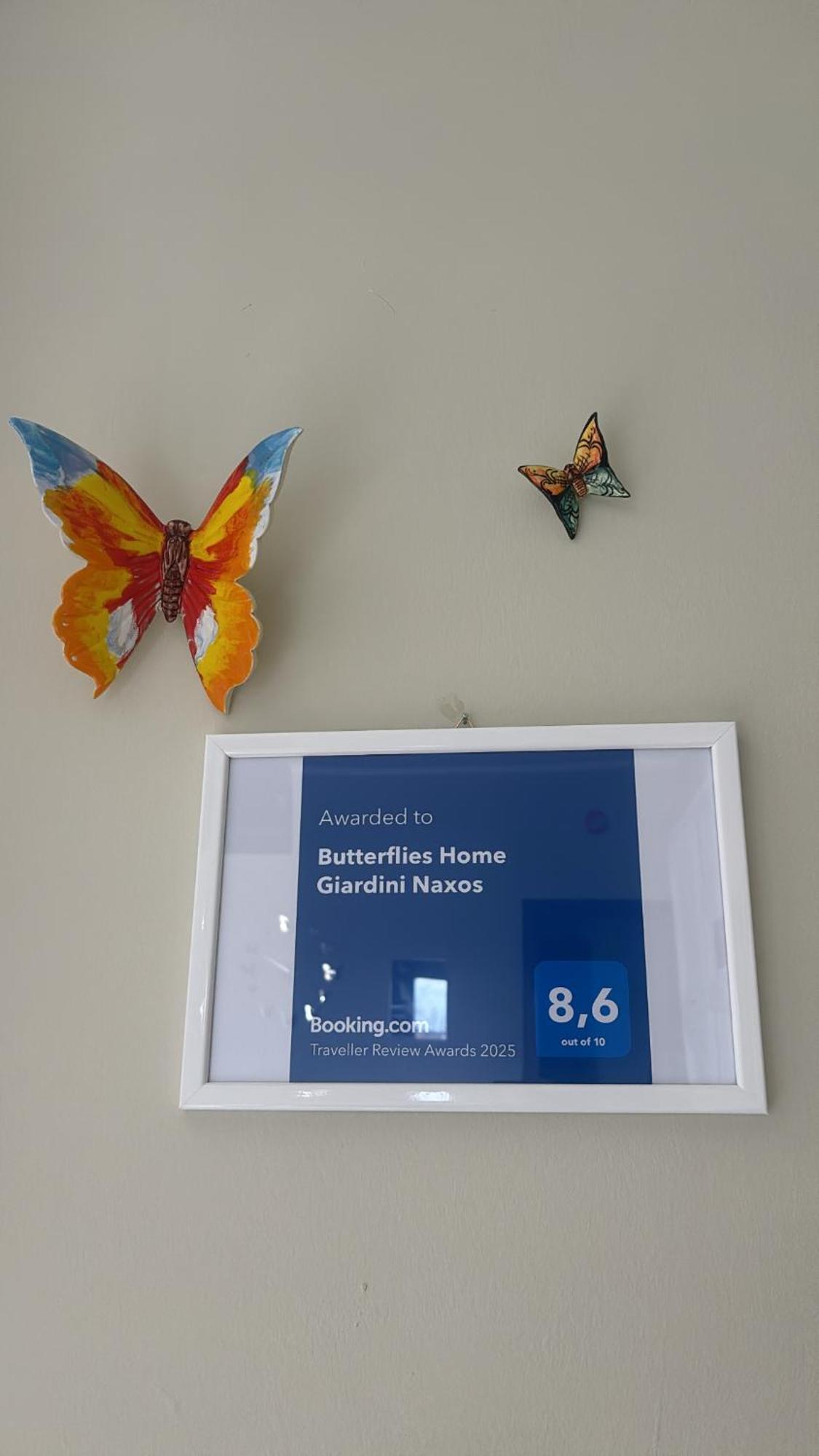 Appartamento Giardini Naxos Butterflies Home Schiso Bagian luar foto